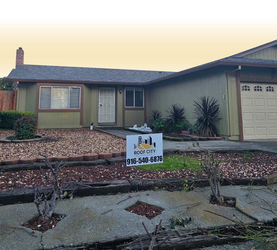 A residential home showing a completed roof installation in Rancho Cordova, CA, with new shingles and a branded sign on the front yard of roof city inc.